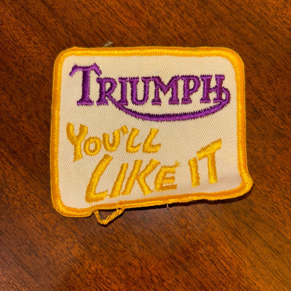 Triumph Patch with Purple and Yellow Embroidery